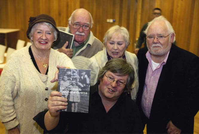 Fig. 14. Marie Redmond, Sean Redmond, Irene Redmond & Fergus Redmond attended the launch of 
Heirlooms & Hand-me-downs. They appeared as children on the cover photo taken in the 1940's. 
Chris Reid is holding the book. Image credit: Johnny Banbury, 2011.