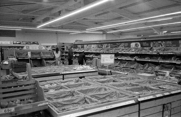 Fig. 8 The supermarket was all but abandoned an hour before it closed.