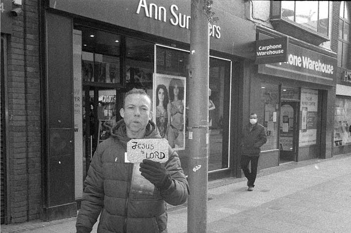 Fig. 9 On the day before St. Patricks day 2020 I needed to buy a new phone. I went to Henry street to look for one. The streets are half empty however there are groups of missionaries standing along the street, offering comfort and selling Jesus, doing good business, it seemed, from people anxious about Covid.