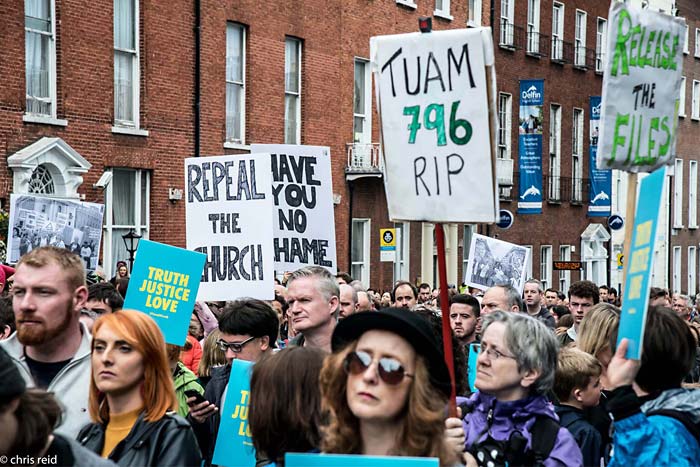 Fig.13 On Parnell Square East, people with placards with messages about truth and injustice.