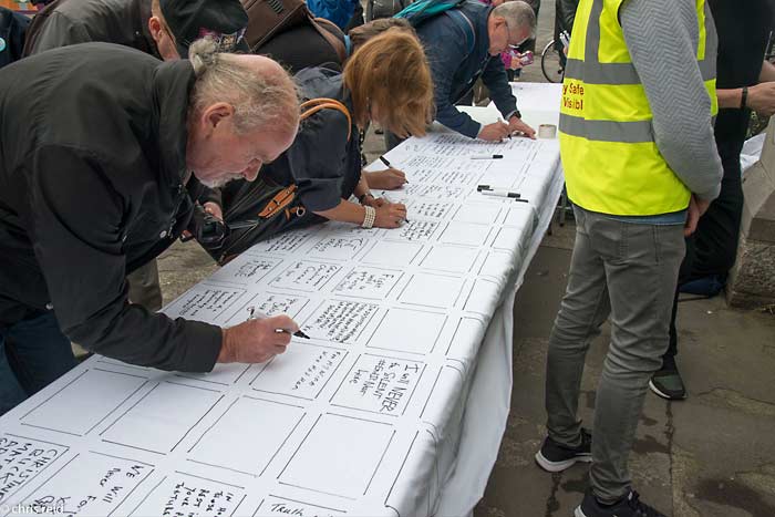 Fig.26 Participants on the Stand for Truth Parade wrote testimonies and messages of solidarity on white sheets that were pegged up outside the former convent and Magdalene Laundry on Sean McDermott Street, Dublin