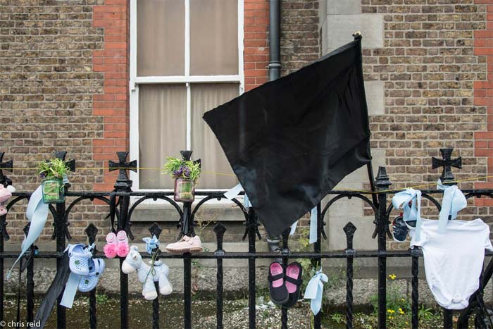 Fig.28 Evocative objects were attached to the railings outside the former 'Monastery of our Lady of Charity of Refuge Convent and Magdalene Laundry', on Sean McDermott Street, Dublin 1.